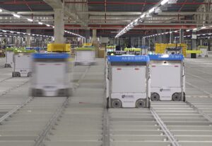 Robots and shelving inside a modern automated warehouse